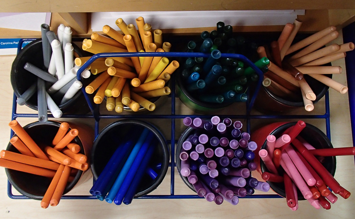Crayons awaiting orders in Nate's 1st Grade classroom as seen on Open House night. 