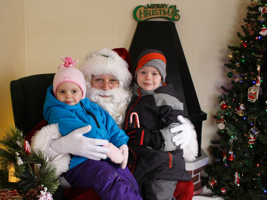 Lily and Nate with Santa at the Crystal Lake Santa house - 2013