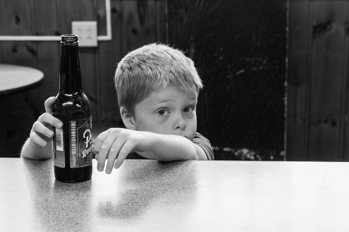 Nate at a bar in Rudolph, WI, drinking Point root beer. 